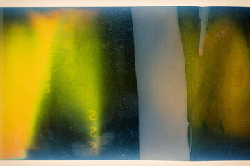 Grungy color 120mm negative film isolated on white background. Medium format film material on white...