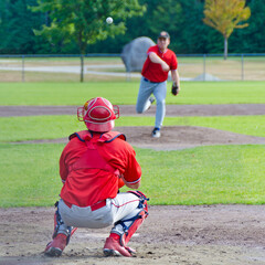 Baseball players playing the sport they love at a small stadium of the minor leagues