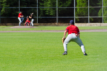 Baseball players playing the sport they love at a small stadium of the minor leagues