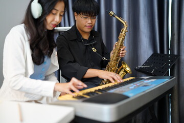 Working Asians are learning international musical skills at home