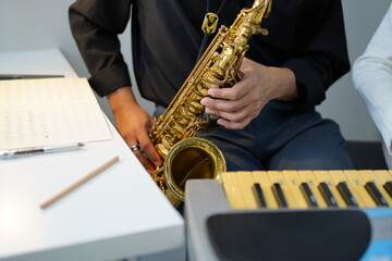 Working Asians are learning international musical skills at home