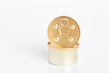 Two closed aluminum cans of cat food on a gray background are located one above the other. Creative concept. Constructor element. mockup