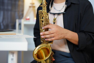 Working Asians are learning international musical skills at home
