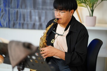 Working Asians are learning international musical skills at home