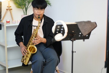 Working Asians are learning international musical skills at home