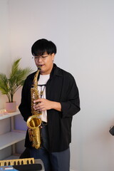 Working Asians are learning international musical skills at home