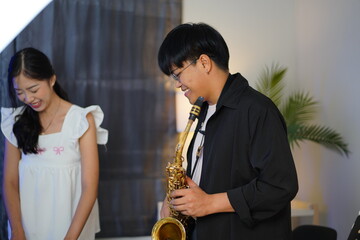 Working Asians are learning international musical skills at home