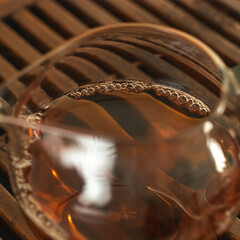 Captivating closeup view showcasing Brewed Tea beautifully presented in a Glass Teapot