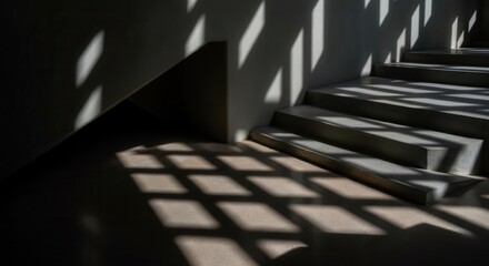 Shadow patterns on modern staircase in sunlight
