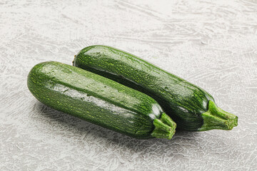 Raw green ripe zucchini vegetable