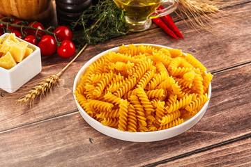 Italian dry pasta Fussili for bowl
