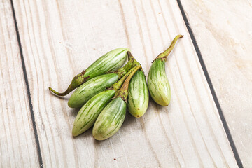 Small organic young green eggplant
