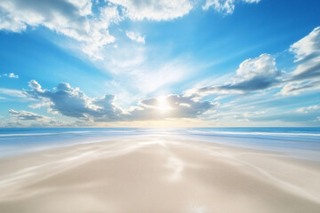 pristine beach with a radiant sunrise casting light across smooth sand and calm ocean under a vibrant blue sky with soft clouds
