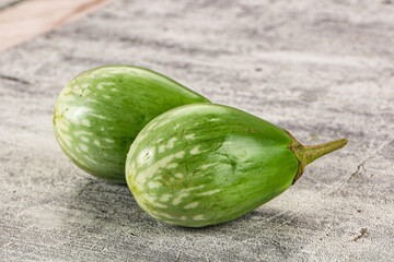 Ripe green mini eggplants heap