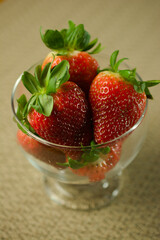 Vibrant Strawberries in a Glass Bowl