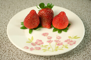 Strawberries on Textured Background