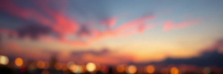 Colorful twilight sky illuminated by city lights showcasing a vibrant sunset over an urban landscape
