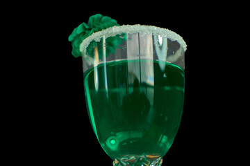 St. Patrick’s Day festive green drink with sugar rim and green accents on black