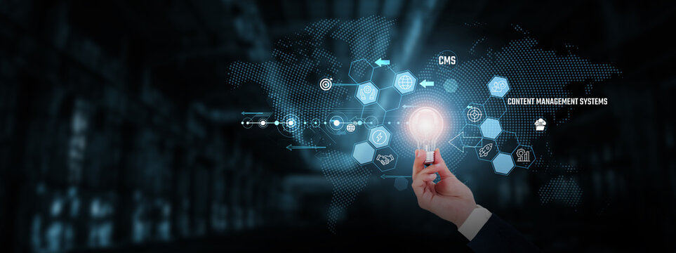 CMS (Content Management Systems): Digital publishing, data organization, website management, user collaboration. Businessman hand holding creative light bulb with innovative technology.