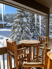 table and chairs in winter wonderland scene