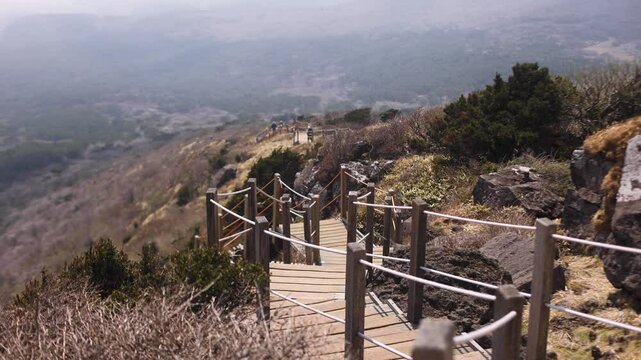 Hallasan National Park, Jeju island, South Korea, spring view of Yeongsil trail with a wooden ladder path stairs, trekking and climbing, stairway to Halla mountain, hiking in Korea, Jeju-do, sunny day