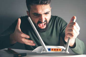 angry man with wifi router