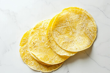 Corn tortillas on white background. Mexican round tortillas.