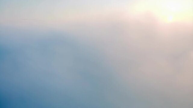 Serene sky transformation captures gentle movement of clouds at sunrise