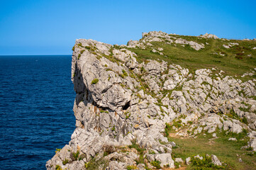 Cliffs at Bufones of Pria in the Cantabrian Sea also known as the Pria Blowholes, are a fascinating...