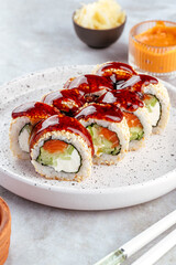 traditional Japanese sushi rolls on a plate