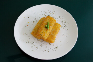 Golden Risoles on White Circle Plate Freshly Made Indonesian Snack Asian Cuisine