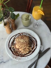 Pancakes with Peanut Butter, Bananas and Chocolate