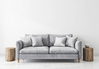 Minimalist living room interior with a gray sofa. wooden side tables. and white walls