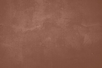 Mocha Mousse toned colour grunge decorative wall background. Art rough stylized texture banner trendy color 2025. Grunge brown color texture