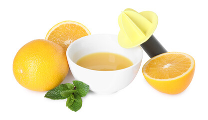 Plastic juicer, fresh orange juice, fruits and mint isolated on white