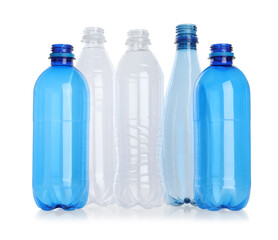 Many empty plastic bottles isolated on white