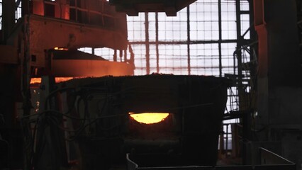 The Industrial Metal Melting Process in foundries creates metallic ingots using advanced...