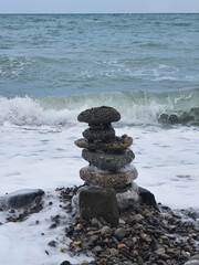 Sea and stones majestic raging sea with splashes and gusts of wind in blue color for your purposes and covers