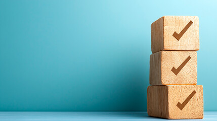 Obraz premium Three Wooden Cubes with Checkmarks on Teal Background