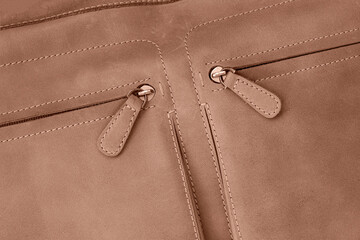 Leather tan bag with zippered pockets