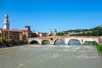 Fototapeta premium the old roman bridge in Verona spans the river Etsch