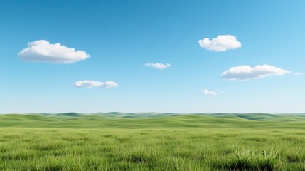 Fototapeta premium A serene landscape featuring green grass and a clear blue sky.
