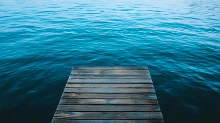 Tranquil Wooden Pier Extending Over Calm Deep Blue Waters Perfect For Relaxation And Meditation...