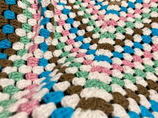 Crochet blanket handmade texture decor artistic background cozy worm photo	
