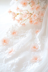 Fototapeta premium Elegant White Fabric with Delicate Peach Flowers
