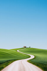 Obraz premium Winding Road Through Green Fields