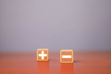 Plus and minus wood block, Wooden blocks with plus minus icons displayed, Plus sign wood block...