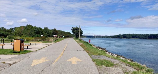 Walking pedestrian pathway by the water