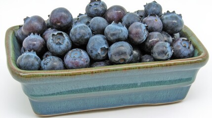Plump Blueberries in a Bowl on a White Surface