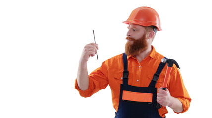 Carpentry and repairing. Repairman in uniform has hammer. Bearded repairman with hammer. Carpenter repairing with nail isolated on white. Repair man. Man hold hammer nail. Copy space banner